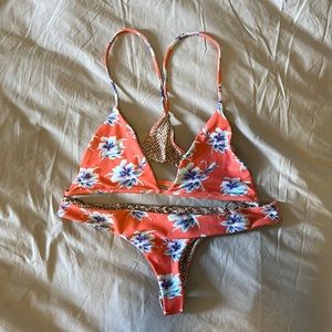 Used Acacia set in Vintage Aloha. Size medium